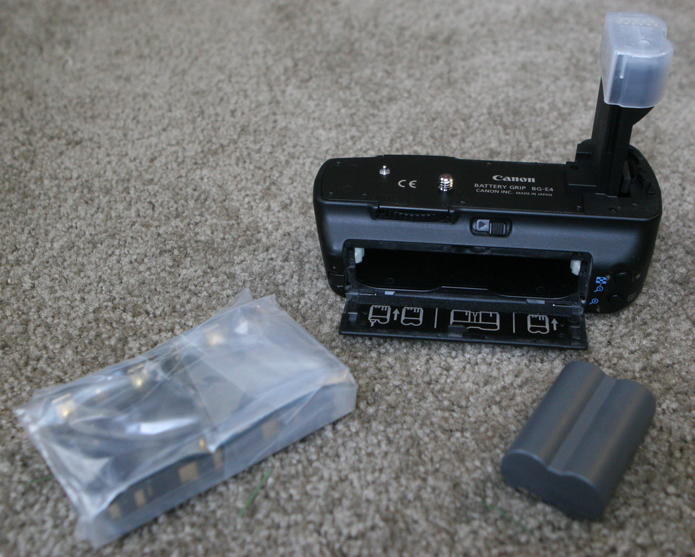 Canon BG-E4 Battery Grip and accessories.