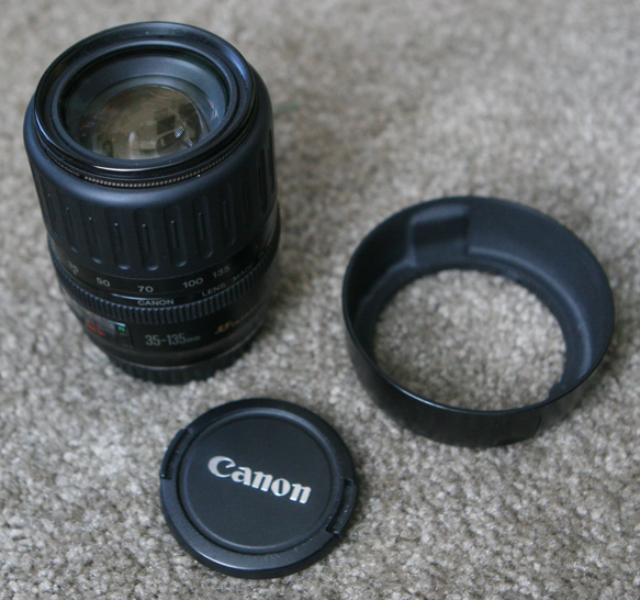 Canon 35-135mm f4-5.6 USM lens with lens hood.